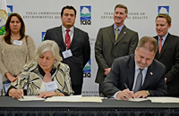 SEMA Secretary Biol. Eglantina Canales Gutiérrez and TCEQ Commissioner Carlos Rubinstein (front) sign memorandum of cooperation, as Coahuila Director of Conservation Alejandra Carrera, Coahuila Attorney General Javier de Jesús Rodríguez, TCEQ Chairman Bryan W. Shaw, Ph.D., and TCEQ Commissioner, Toby Baker look on. TCEQ and Secretariat of Environment of Coahuila Sign a Memorandum of Cooperation