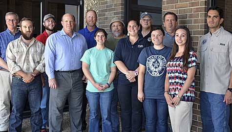 (Back row from left) David Mann, Kaleb Nehring, Jason Neumann, Tim Blackmon, Jeff Kunze, and Robert Ozment. (Front row from left) Stephen Julian, David Van Soest, Elizabeth Moman, Rebecca Tyra, Gailynn Milligan, Laura Fanestiel, and Richard Monreal.