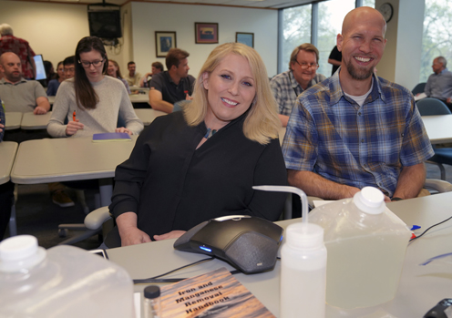 Cari-Michel LaCaille attending a meeting with the Plans and Technical Review Section Manager Joel Klumpp.
