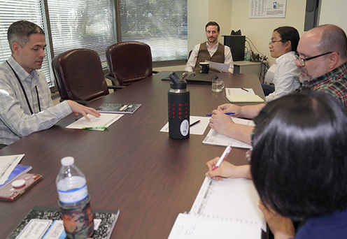 Nate Hickman meets with his team to discuss grants and data for the TERP program.