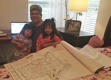 Bob Castro teaches his kids how to review Edwards Aquifer plans.