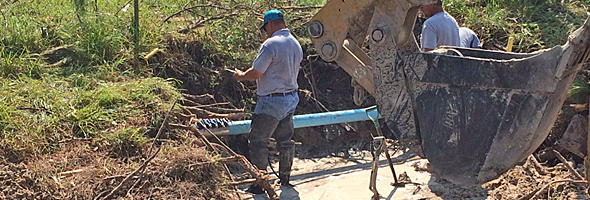 Workers from Jonah Special Utility District repair pipelines near Holiday Beach