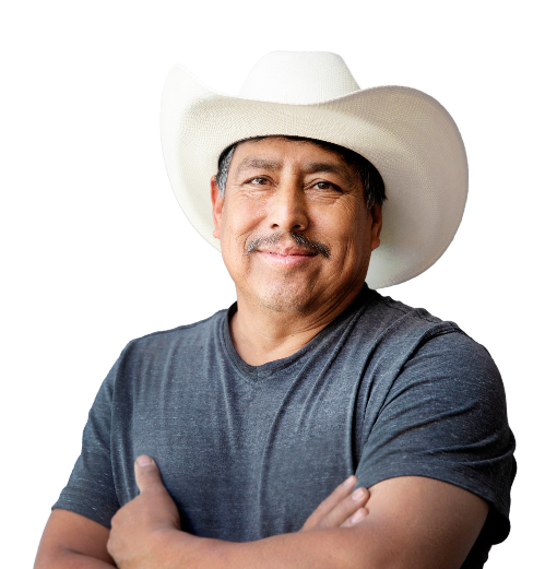 Man in t-shirt with cowboy hat. Crossing his arms.