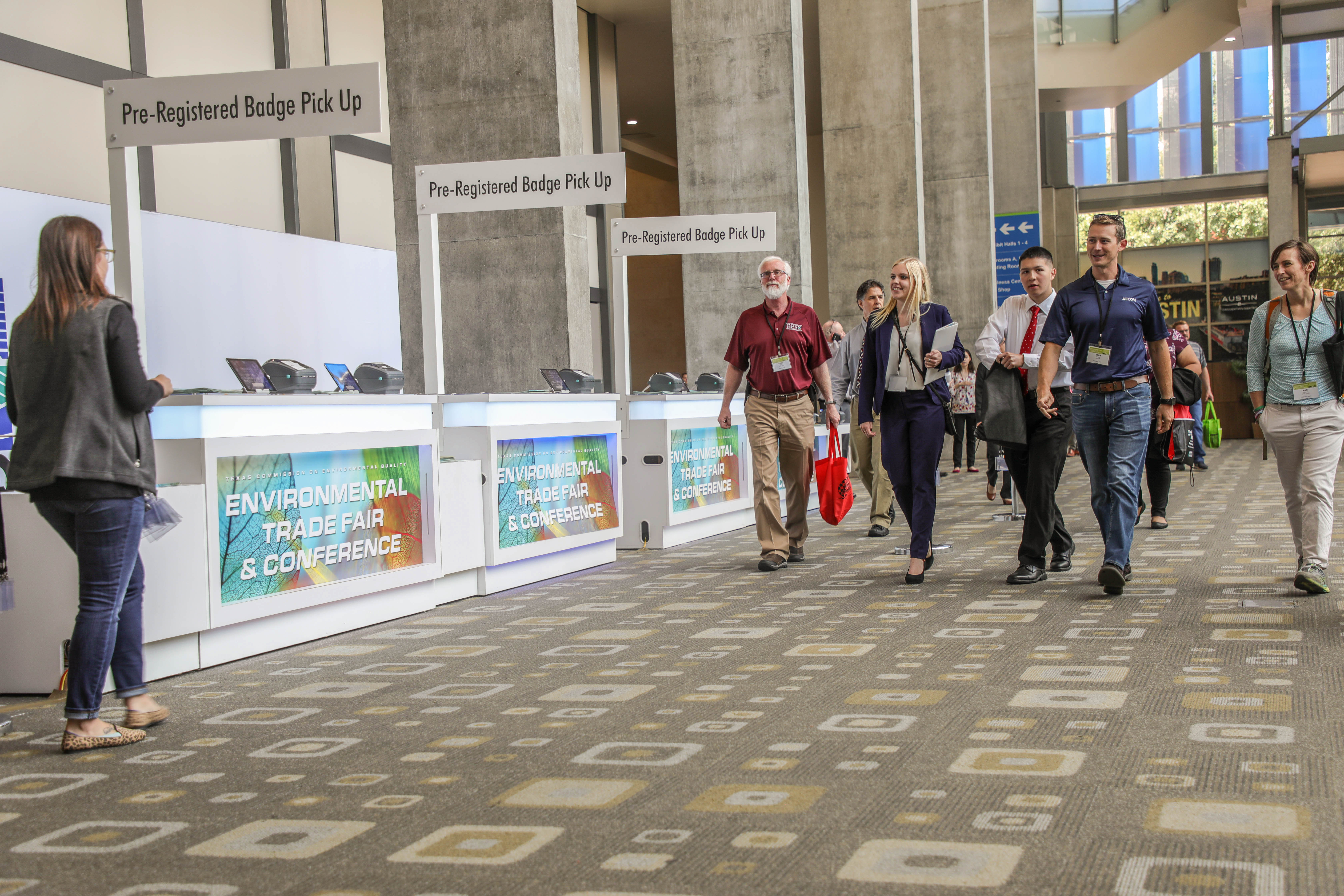 A picture showing conference attendees in the foyer of the Convention Center.