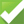 White check mark on a green background