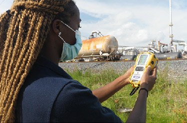 SFR-57/20: Multirae TCEQ staffer using a MultiRAE after Hurricane Laura. These handheld monitors provide instantaneous readings for various compounds when present in the air.