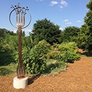 Thumbnail of the fork sculpture at Festival Beach Food Forest.
