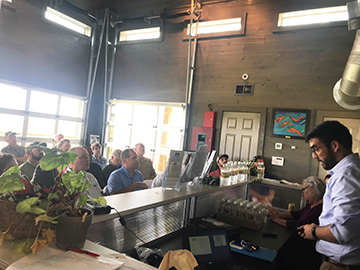 photo of presenter and stakeholders