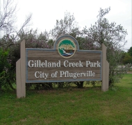 a photo of the Gilleland Creek park sign