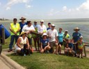 Stakeholders gathered in July 2014 to mark storm drains in Corpus Christi with a message reminding residents that was goes in the storm drain winds up in the bay.  Thumbnail Image